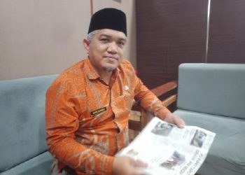 Kepala Bidang (Kabid) Pembinaan SMA Disdik Provsu Muhammad Basir Hasibuan SPd.